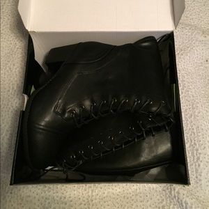 Knee high lace up boots